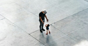 dad walking with child