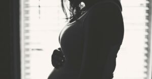 pregnant woman looking concerned