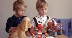 parents sitting with adopted baby